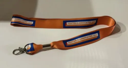 Orange lanyard with metal clip attachment.